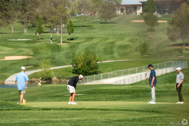 view of home's community with view of golf course