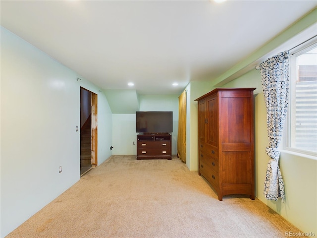 interior space featuring light colored carpet