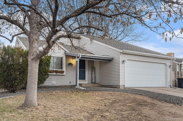 single story home with an attached garage, driveway, and roof with shingles