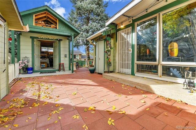 wooden deck with a patio