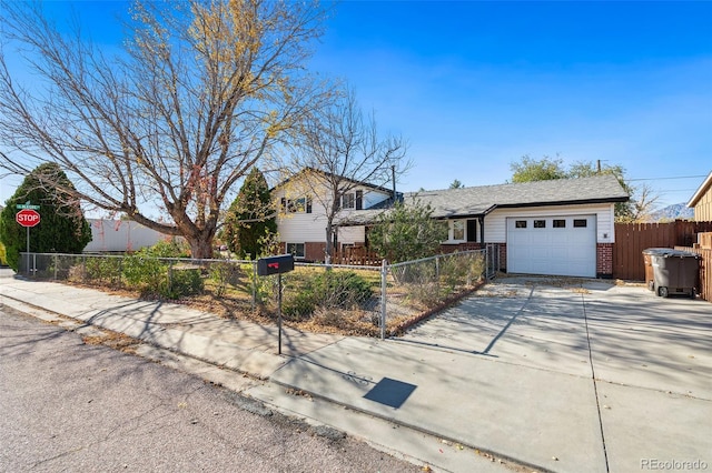 view of front facade with a garage and a jacuzzi