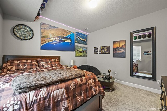 16256 Ute Peak Way, Broomfield, CO 80023 - carpeted bedroom with a textured ceiling and baseboards
