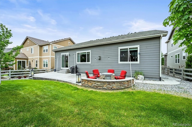 16256 Ute Peak Way, Broomfield, CO 80023 - back of property with entry steps, a patio, a fenced backyard, and a fire pit