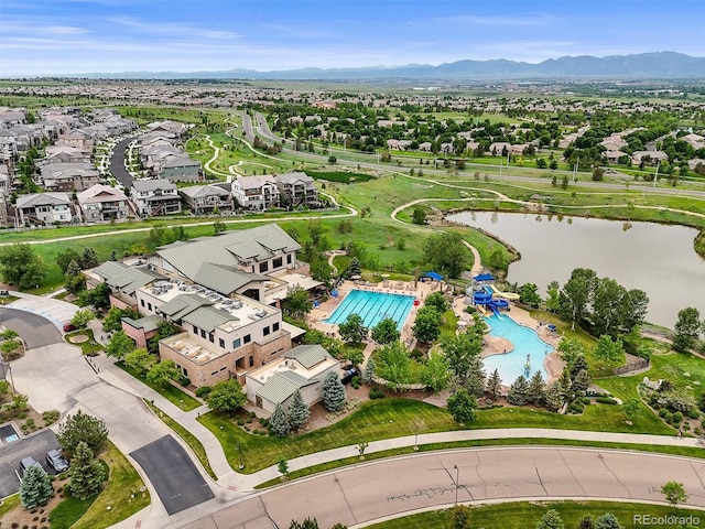 16256 Ute Peak Way, Broomfield, CO 80023 - drone / aerial view of a pool area and a water and mountain view