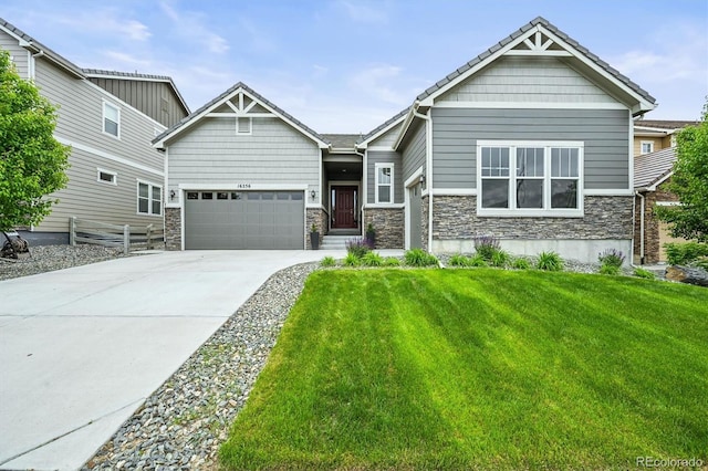 16256 Ute Peak Way, Broomfield, CO 80023 - craftsman-style house with driveway, stone siding, and an attached garage