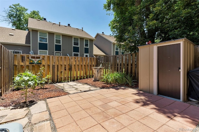 11604 Community Center Dr Unit 8, Northglenn, CO 80233 - view of patio / terrace featuring a storage unit