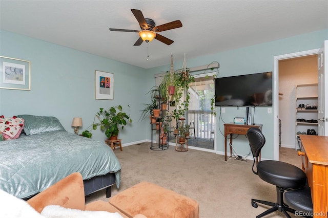 11604 Community Center Dr Unit 8, Northglenn, CO 80233 - carpeted bedroom featuring access to exterior and ceiling fan