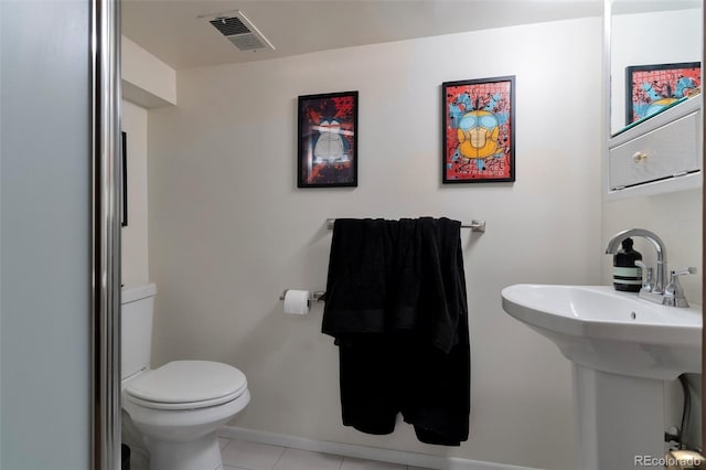 11604 Community Center Dr Unit 8, Northglenn, CO 80233 - bathroom featuring tile patterned floors and toilet