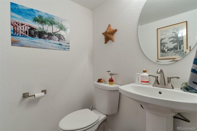 11604 Community Center Dr Unit 8, Northglenn, CO 80233 - bathroom with toilet and a sink