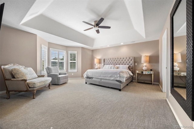 404 Yarrow Pl, Castle Pines, CO 80108 - bedroom featuring light carpet, a raised ceiling, baseboards, and ceiling fan
