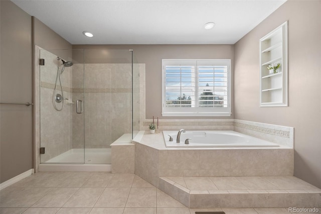 404 Yarrow Pl, Castle Pines, CO 80108 - bathroom with tile patterned flooring, a shower stall, and a garden tub