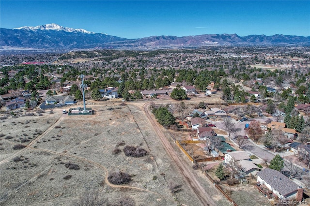 aerial view featuring a mountain view and a residential view