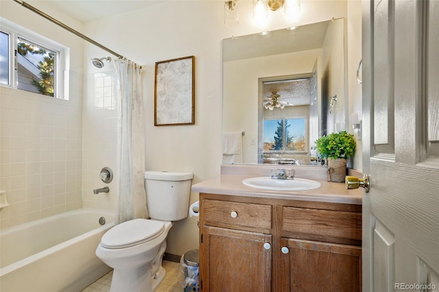 full bathroom featuring shower / bath combo, vanity, toilet, and tile patterned floors