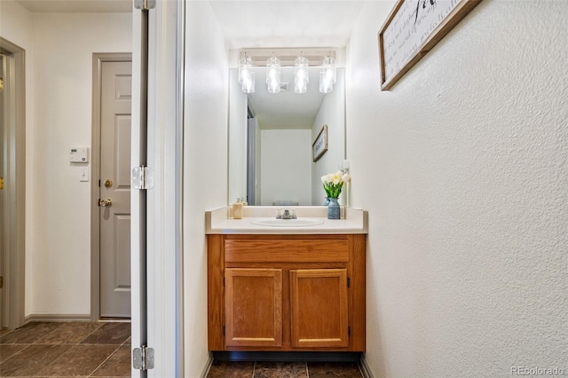 bathroom featuring vanity and tile patterned flooring