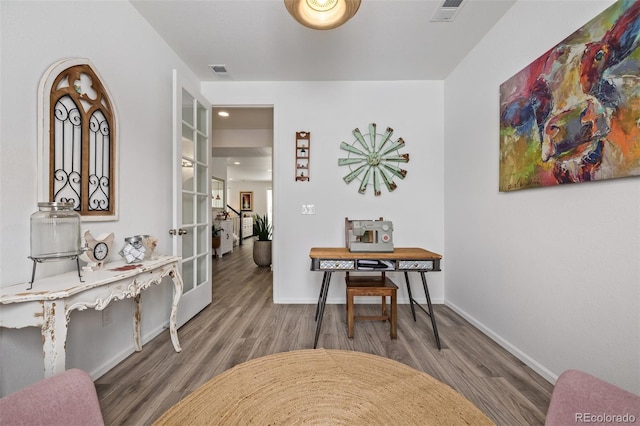 interior space featuring french doors and wood-type flooring