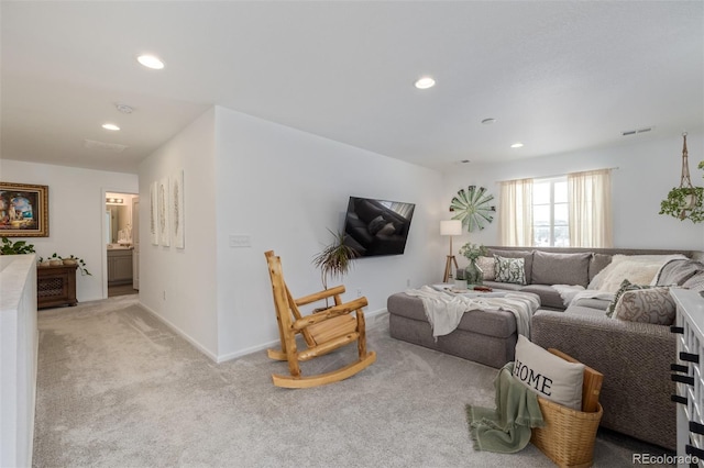 living room with light colored carpet