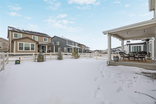 view of yard covered in snow