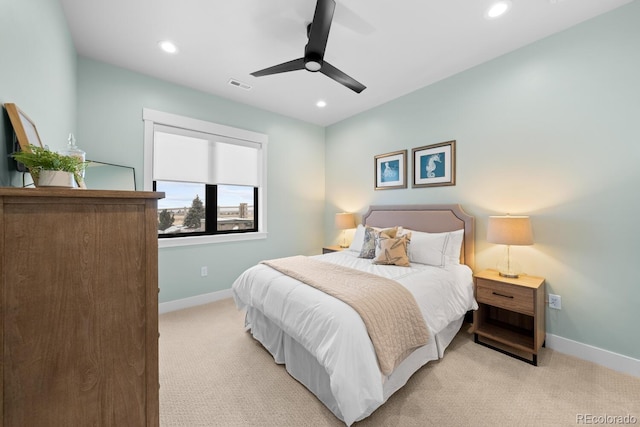 bedroom featuring baseboards, visible vents, a ceiling fan, light colored carpet, and recessed lighting