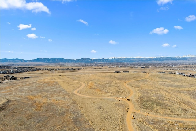 bird's eye view featuring a rural view and a mountain view