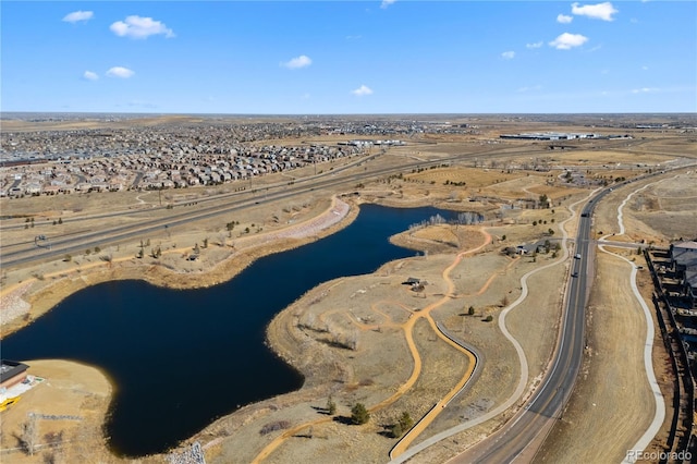 drone / aerial view with a water view