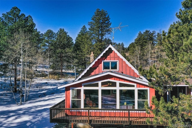 view of property exterior featuring a deck