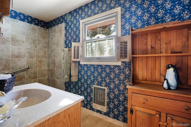 bathroom featuring vanity and tile patterned floors