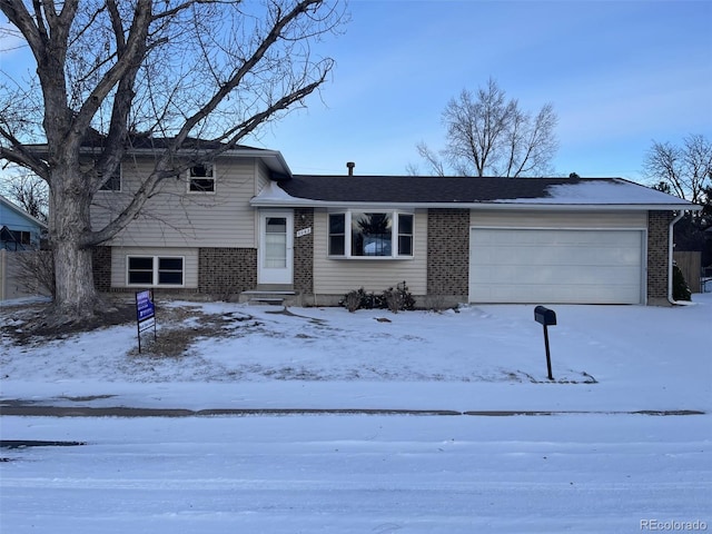 tri-level home featuring a garage