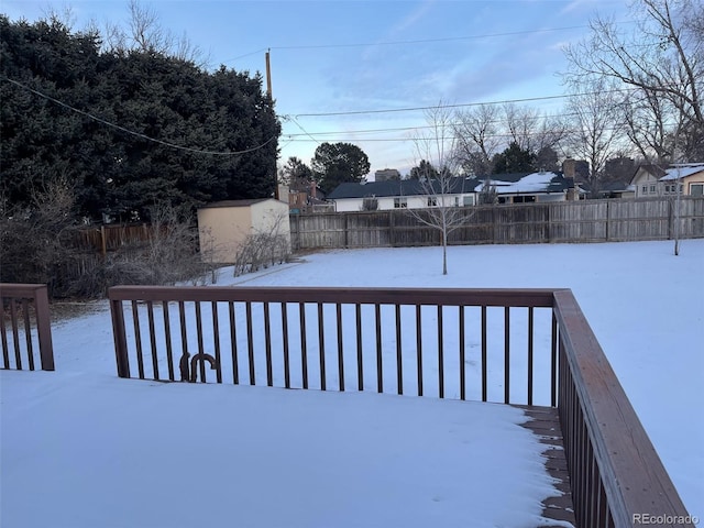 view of snow covered deck