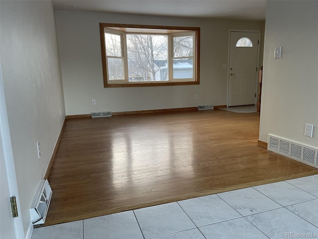 entrance foyer featuring light tile patterned floors