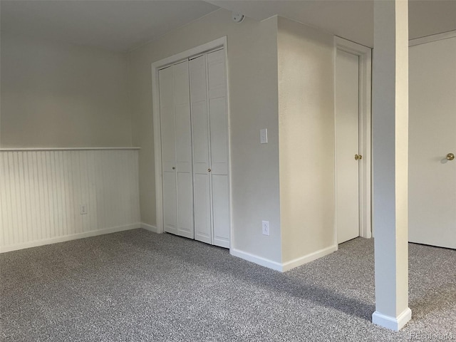 unfurnished bedroom with carpet