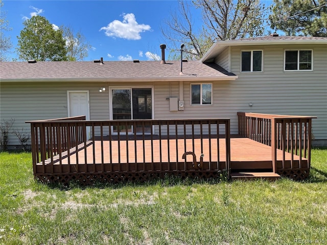 3062 S Florence Ct, Denver, CO 80231 - rear view of property with a yard, a deck, and a shingled roof