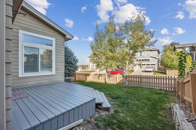 view of yard with central air condition unit and a wooden deck