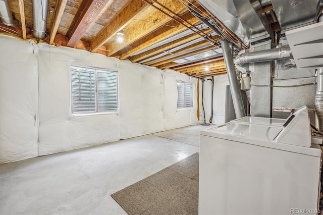 basement featuring washing machine and dryer