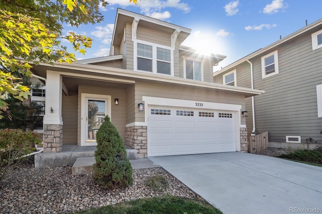 view of front of home with a garage