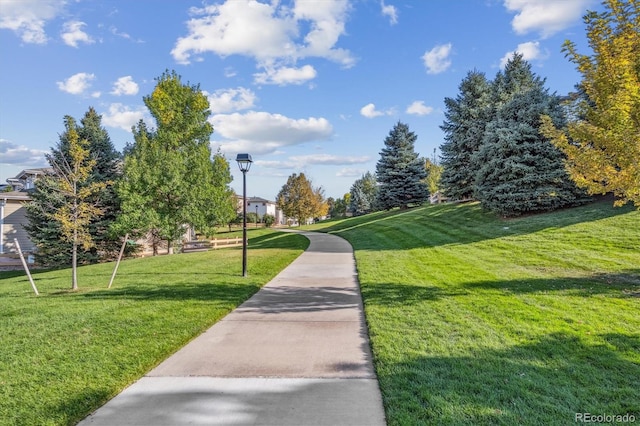 surrounding community featuring a yard