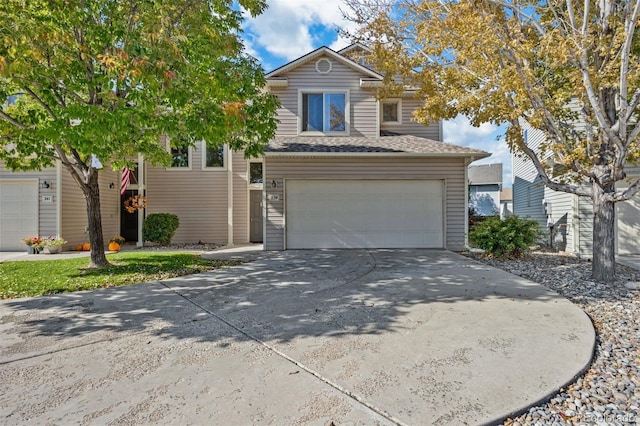 view of front of property with a garage