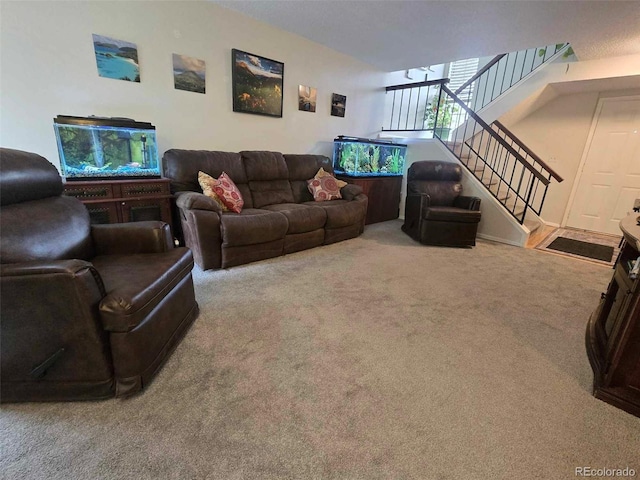 living area with stairway and carpet flooring