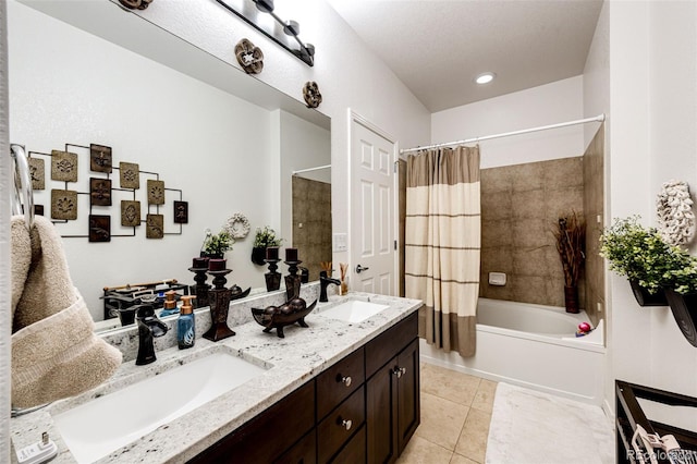 bathroom featuring tile patterned floors, vanity, and shower / tub combo