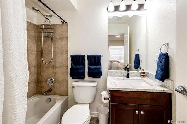 full bathroom featuring vanity, toilet, and shower / bathtub combination with curtain