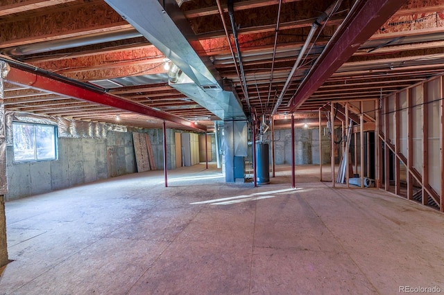 basement featuring gas water heater