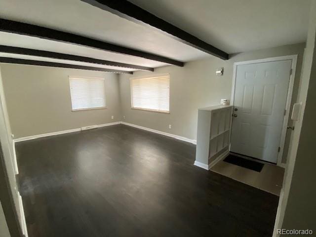217 Ford St, Golden, CO 80403 - foyer with baseboards, dark wood finished floors, and beamed ceiling