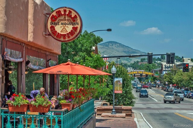 217 Ford St, Golden, CO 80403 - exterior space featuring street lighting, a mountain view, curbs, and sidewalks