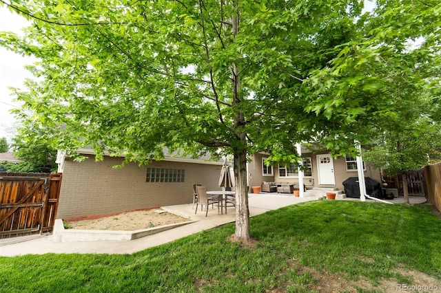 1317 S Saint Paul St, Denver, CO 80210 - view of yard with a patio area and a gate
