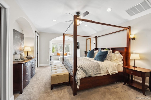 1317 S Saint Paul St, Denver, CO 80210 - bedroom with arched walkways, light carpet, recessed lighting, baseboards, and vaulted ceiling