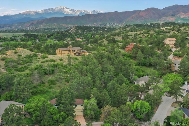 595 Wintery Cir, Colorado Springs, CO 80919 - aerial overview of property's location with mountains