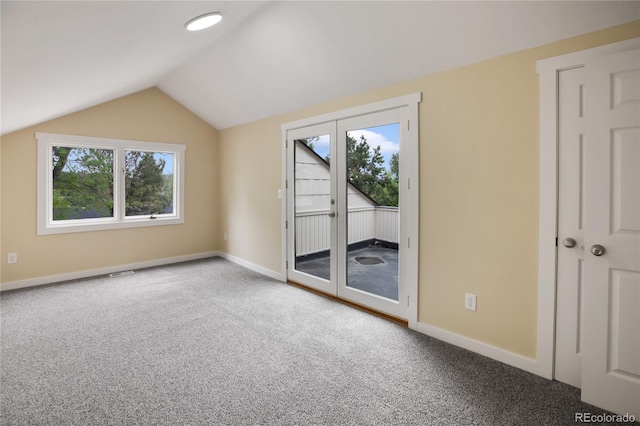 595 Wintery Cir, Colorado Springs, CO 80919 - additional living space featuring lofted ceiling, carpet, and baseboards