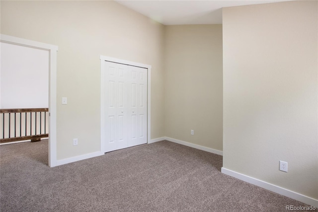 595 Wintery Cir, Colorado Springs, CO 80919 - unfurnished bedroom featuring carpet flooring, baseboards, and a closet