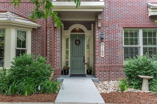 9165 Kornbrust Dr, Lone Tree, CO 80124 - doorway to property featuring brick siding