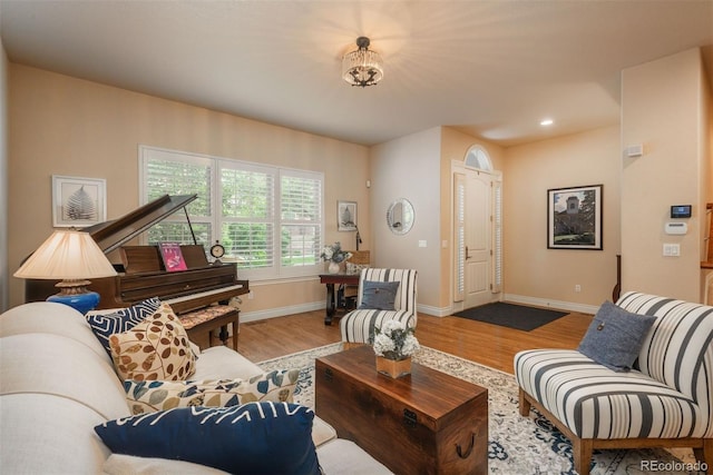 9165 Kornbrust Dr, Lone Tree, CO 80124 - living room with wood finished floors, baseboards, and recessed lighting