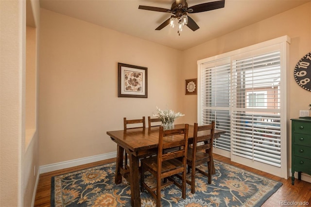 9165 Kornbrust Dr, Lone Tree, CO 80124 - dining area with ceiling fan, wood finished floors, and baseboards